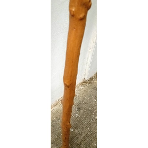 1127 - A folk art walking stick, handle carved in the form of a man wearing a hat, 90 cm Provenance: Part o... 