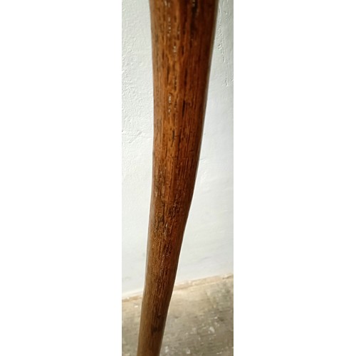 1128 - A folk art walking stick, handle carved in the form of a man's head, 92 cm Provenance: Part of a sin... 