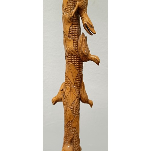 1131 - A good folk art walking stick, carved figures and animals, 97 cm Provenance: Part of a single owner ... 