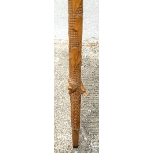 1131 - A good folk art walking stick, carved figures and animals, 97 cm Provenance: Part of a single owner ... 