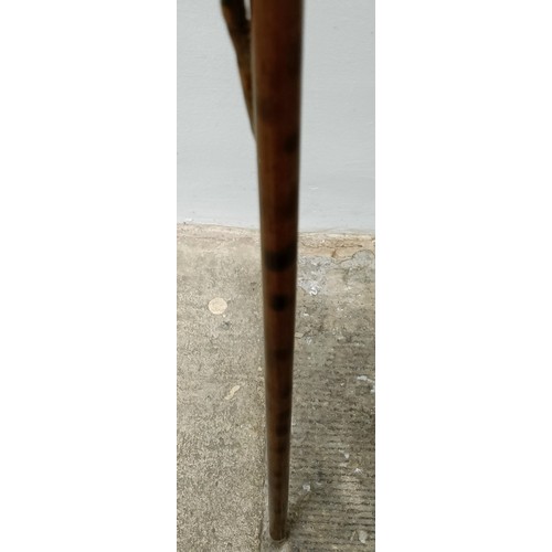 1138 - An early 20th century, novelty walking stick, with a carved bamboo handle decorated animals, inset w... 