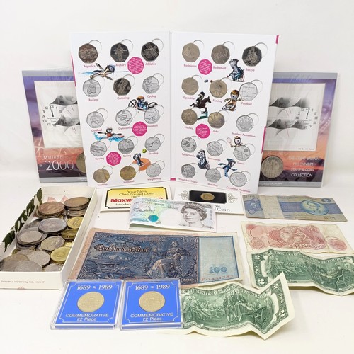 269 - Assorted modern commemorative coins, and a small group of banknotes