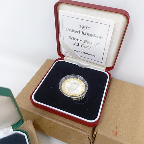 280 - A silver proof 5p two coin set, 1990, boxed and other commemorative coins, all boxed