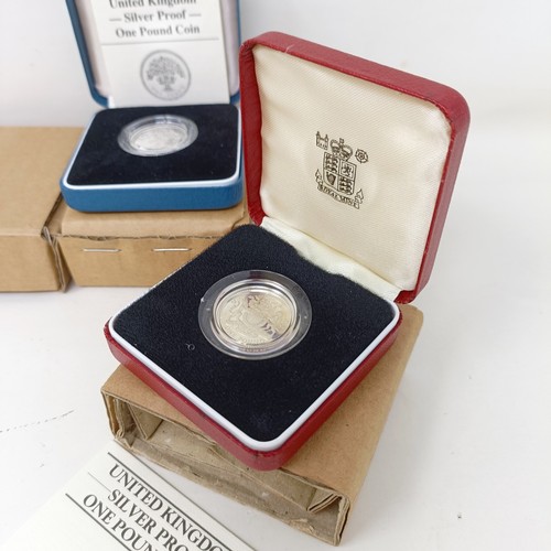 280 - A silver proof 5p two coin set, 1990, boxed and other commemorative coins, all boxed