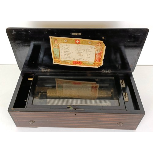 848 - A music box, the 52cm wide cylinder playing eight airs, in a rosewood case, 52 cm wide