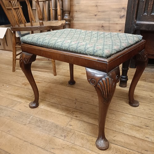 1310 - A mahogany footstool, with an embroidered drop in seat