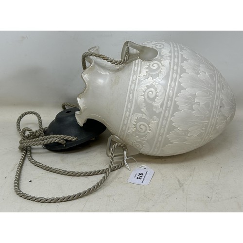 811 - A Victorian style opaque and painted glass hanging lantern, of ovoid form, 24 cm high (excluding fit... 