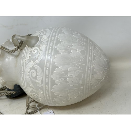 811 - A Victorian style opaque and painted glass hanging lantern, of ovoid form, 24 cm high (excluding fit... 