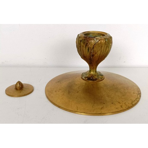 834 - A gilt brass inkwell, 14 cm diameter