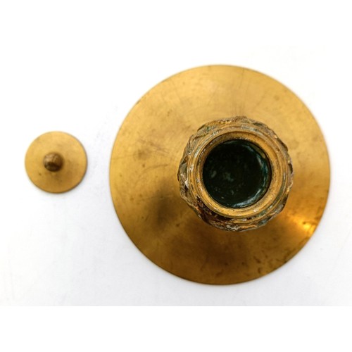 834 - A gilt brass inkwell, 14 cm diameter