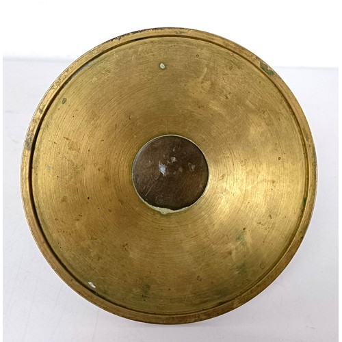 834 - A gilt brass inkwell, 14 cm diameter