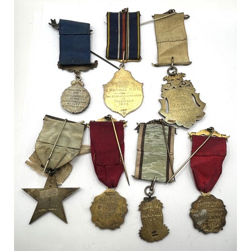 831 - A silver Masonic medal for Queen Victoria Lodge, and assorted other medals (7)