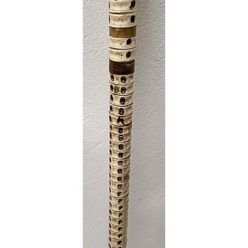 758 - A late 19th/early 20th century fish vertebrae walking stick, 88 cm Provenance: Part of a single owne... 