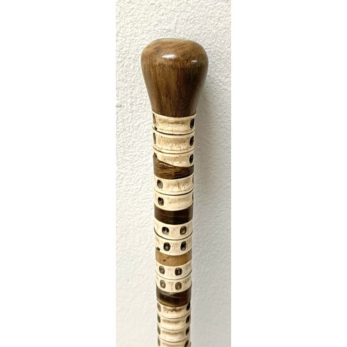758 - A late 19th/early 20th century fish vertebrae walking stick, 88 cm Provenance: Part of a single owne... 