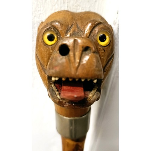 771 - An early 20th century novelty walking stick, handle carved in the form of a bulldog, with a silver p... 