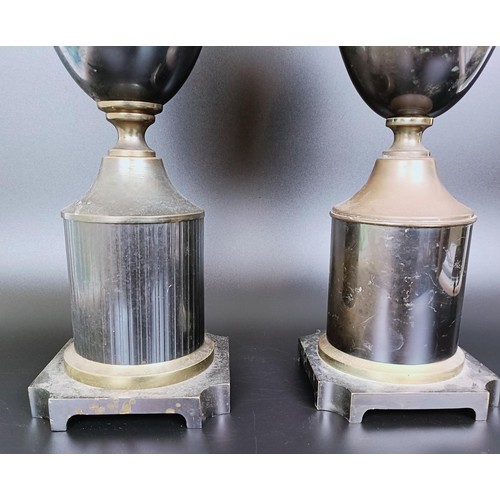 820 - A pair of bronze silver plated lamp bases, 57 cm high (2)
