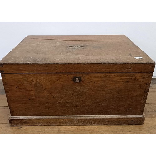 819 - A canteen of cutlery, in an oak case, with a four piece tea service