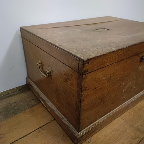 819 - A canteen of cutlery, in an oak case, with a four piece tea service