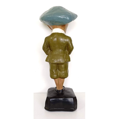 2 - A painted plaster golfing advertising figure, He Played A Penfold, 50 cm high