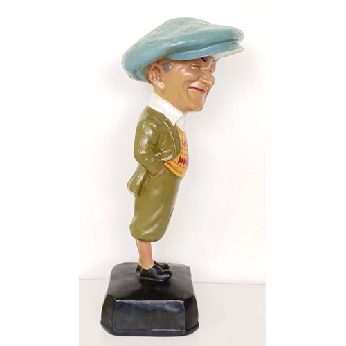 2 - A painted plaster golfing advertising figure, He Played A Penfold, 50 cm high
