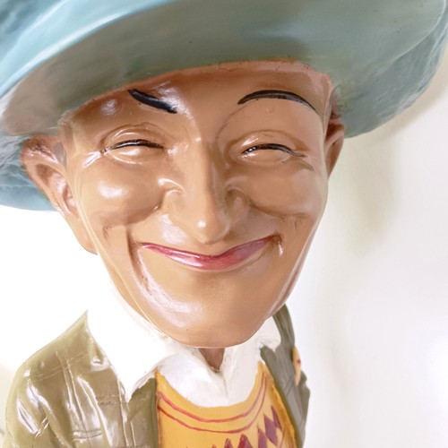 2 - A painted plaster golfing advertising figure, He Played A Penfold, 50 cm high