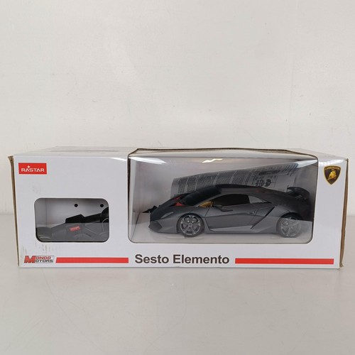 59 - A radio controlled Bentley Continental GT car, a similar Lamborghini, Jaguar calendars and posters (... 