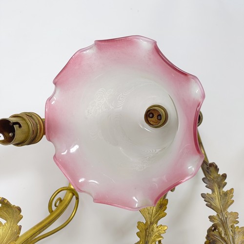 777 - A gilt metal two branch wall light, 36 cm wide, a pair of matching single wall lights, a pair of sil... 