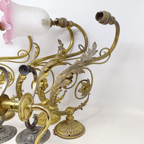 777 - A gilt metal two branch wall light, 36 cm wide, a pair of matching single wall lights, a pair of sil... 