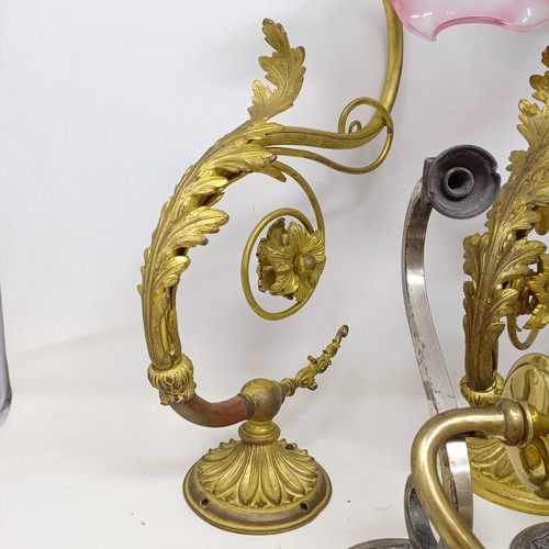 777 - A gilt metal two branch wall light, 36 cm wide, a pair of matching single wall lights, a pair of sil... 