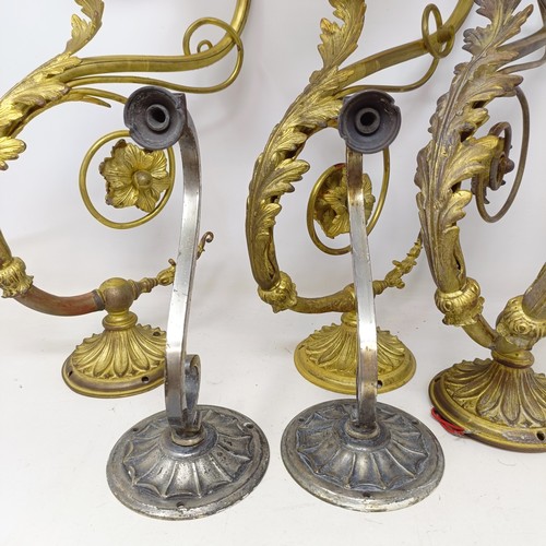 777 - A gilt metal two branch wall light, 36 cm wide, a pair of matching single wall lights, a pair of sil... 