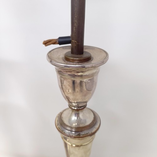 781 - A pair of silver plated candlesticks, converted to lamps, 46 cm high (2)