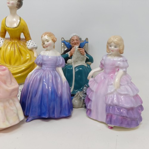 786 - ***Regretfully Withdrawn*** Assorted Royal Doulton figures, film photographs, and assorted postcards... 