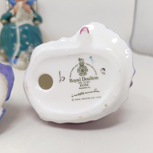 786 - ***Regretfully Withdrawn*** Assorted Royal Doulton figures, film photographs, and assorted postcards... 