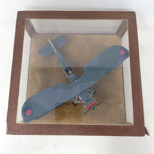 778 - A model of an RAF bi-plane, in a glass case, 19 cm wide