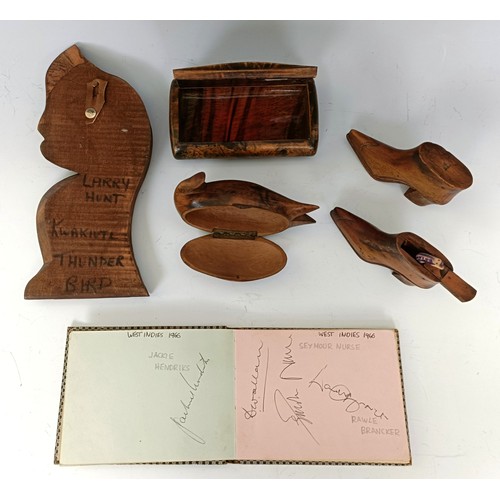 876 - A treen novelty snuff box, in the form of a boot, another, a novelty snuff box in the form of a fish... 