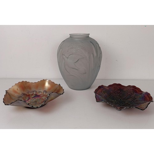 801A - An opaque glass vase, decorated birds and bulrushes, 30 cm high and two Carnival glass bowls, 23 cm ... 