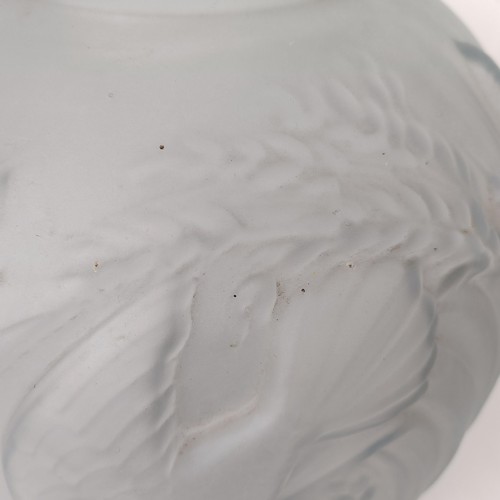 801A - An opaque glass vase, decorated birds and bulrushes, 30 cm high and two Carnival glass bowls, 23 cm ... 