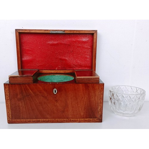 863 - A 19th century mahogany tea caddy, the hinged lid to reveal two compartments and a mixing bowl, 25 c... 