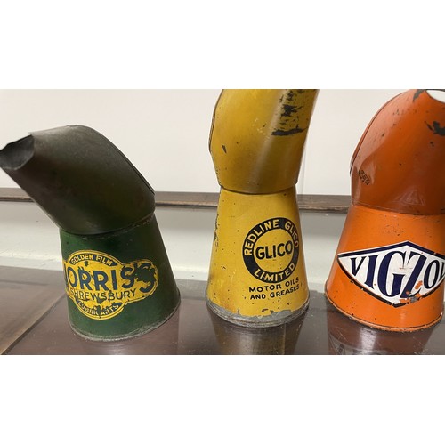 45 - A Morris Shrewsbury Golden Film Lubricants oil jug, 17.5 cm high, and three others (4)Please see our... 