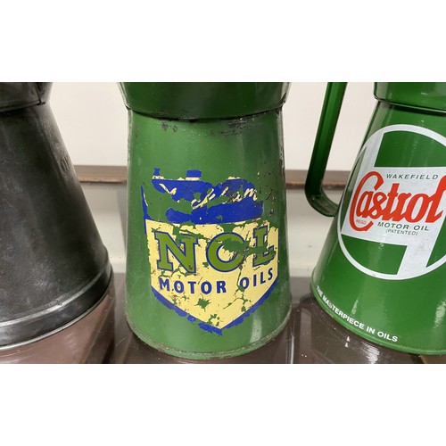 46 - A Duckham's NOL Motor Oil jug, 25.5 cm high, and two others (3)Please see our terms and conditions i... 