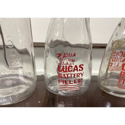 48 - Four Lucas Battery glass Fillers, and other forecourt itemsPlease see our terms and conditions in re... 