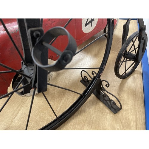 58 - A child's copy of a Ordinary bicycle (penny farthing), 84 cm high, on a standPlease see our terms an... 