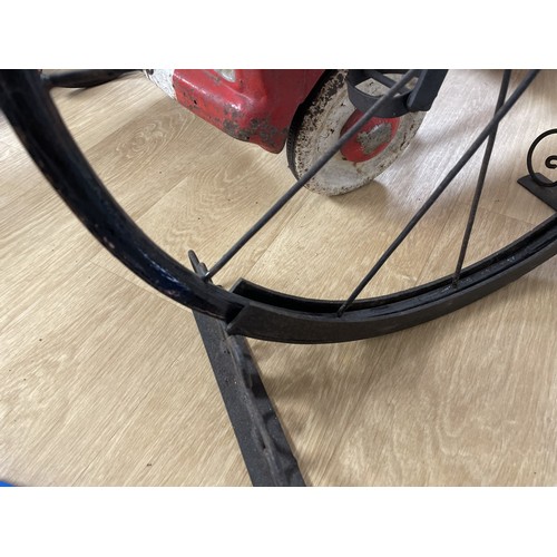 58 - A child's copy of a Ordinary bicycle (penny farthing), 84 cm high, on a standPlease see our terms an... 