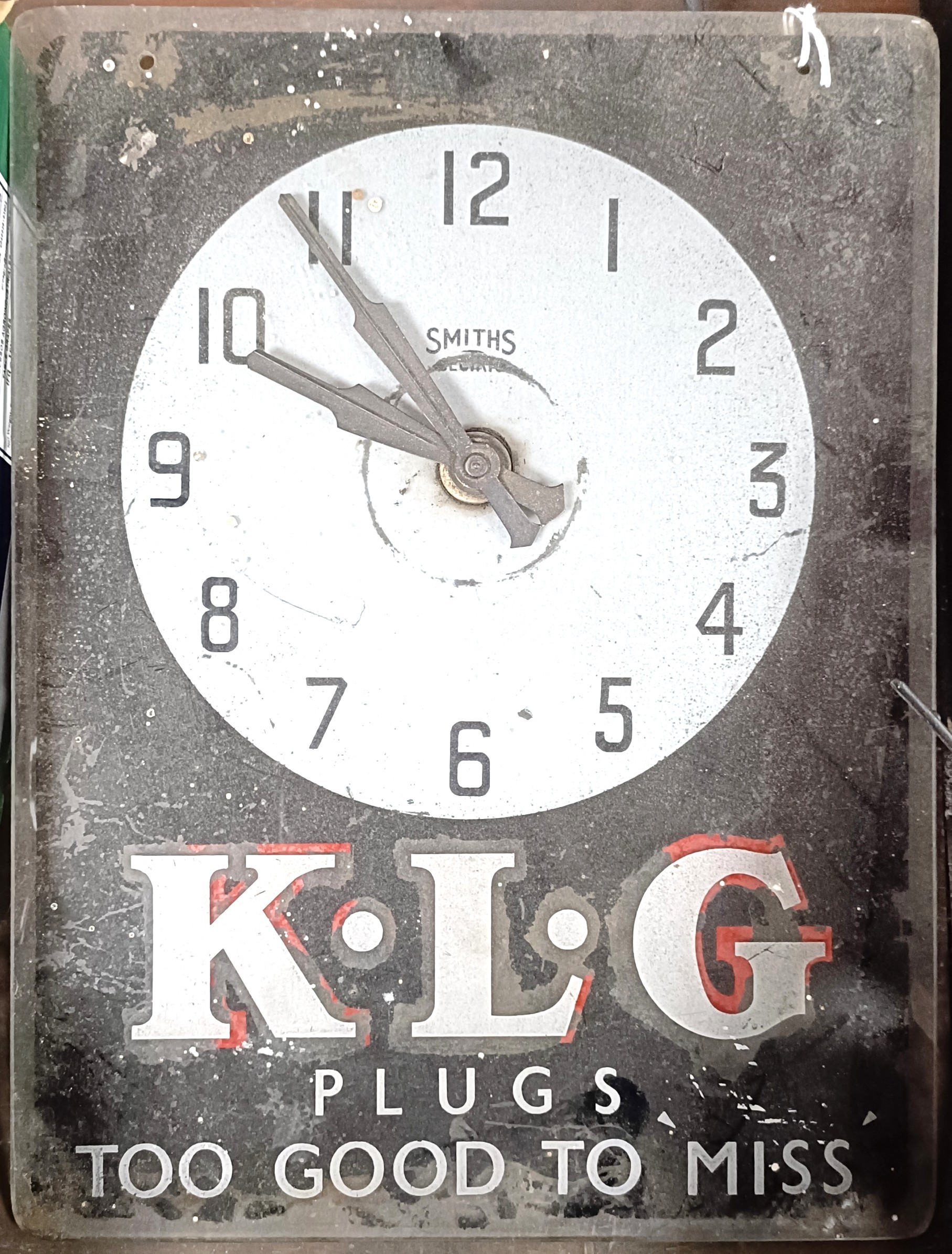 A KLG Plugs Too Good To Miss clock, 26.5 cm widePlease see our terms ...