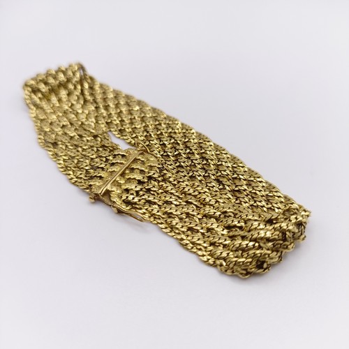 416 - A 1970s 18ct gold textured bracelet, 36.2 g, 21 cm long