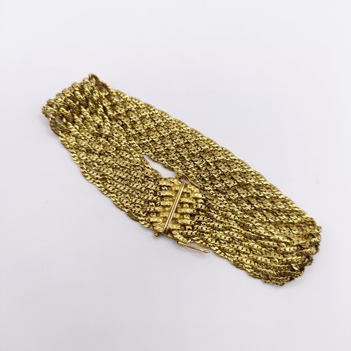 416 - A 1970s 18ct gold textured bracelet, 36.2 g, 21 cm long