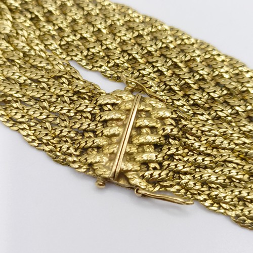 416 - A 1970s 18ct gold textured bracelet, 36.2 g, 21 cm long