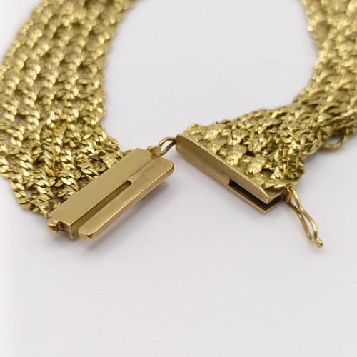 416 - A 1970s 18ct gold textured bracelet, 36.2 g, 21 cm long