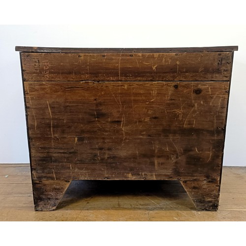 1323 - A 19th century mahogany serpentine front chest, having three long drawers, 118 cm wide