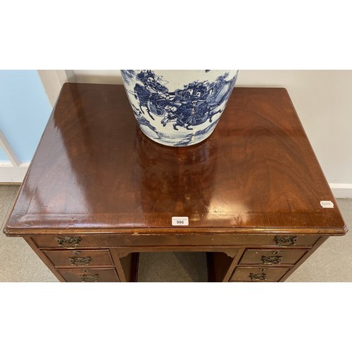 1324 - A George III style mahogany kneehole desk, 80 cm wide